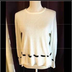 DESIGN HISTORY Ivory lightweight sweater.